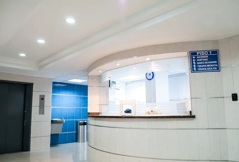 Bright wellness clinic reception area with plants