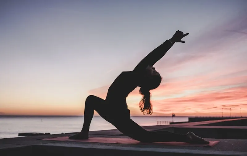 Yoga mat and wellness gear in a clean local studio