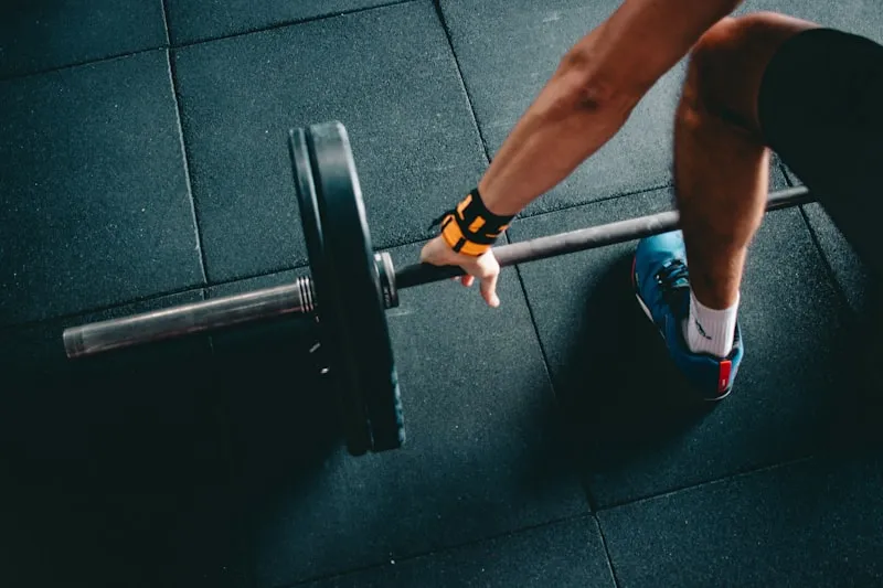 Fitness and wellness studio detail with dumbbells on rack