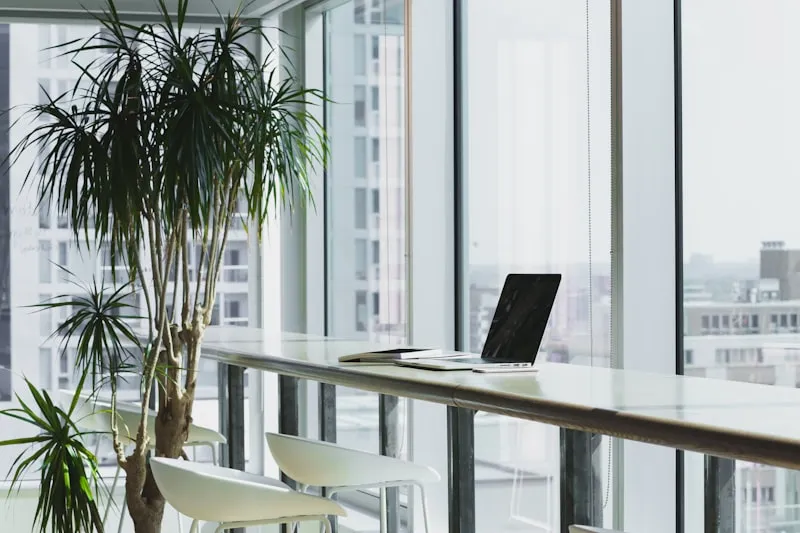 Clean modern office workspace with computers and desks