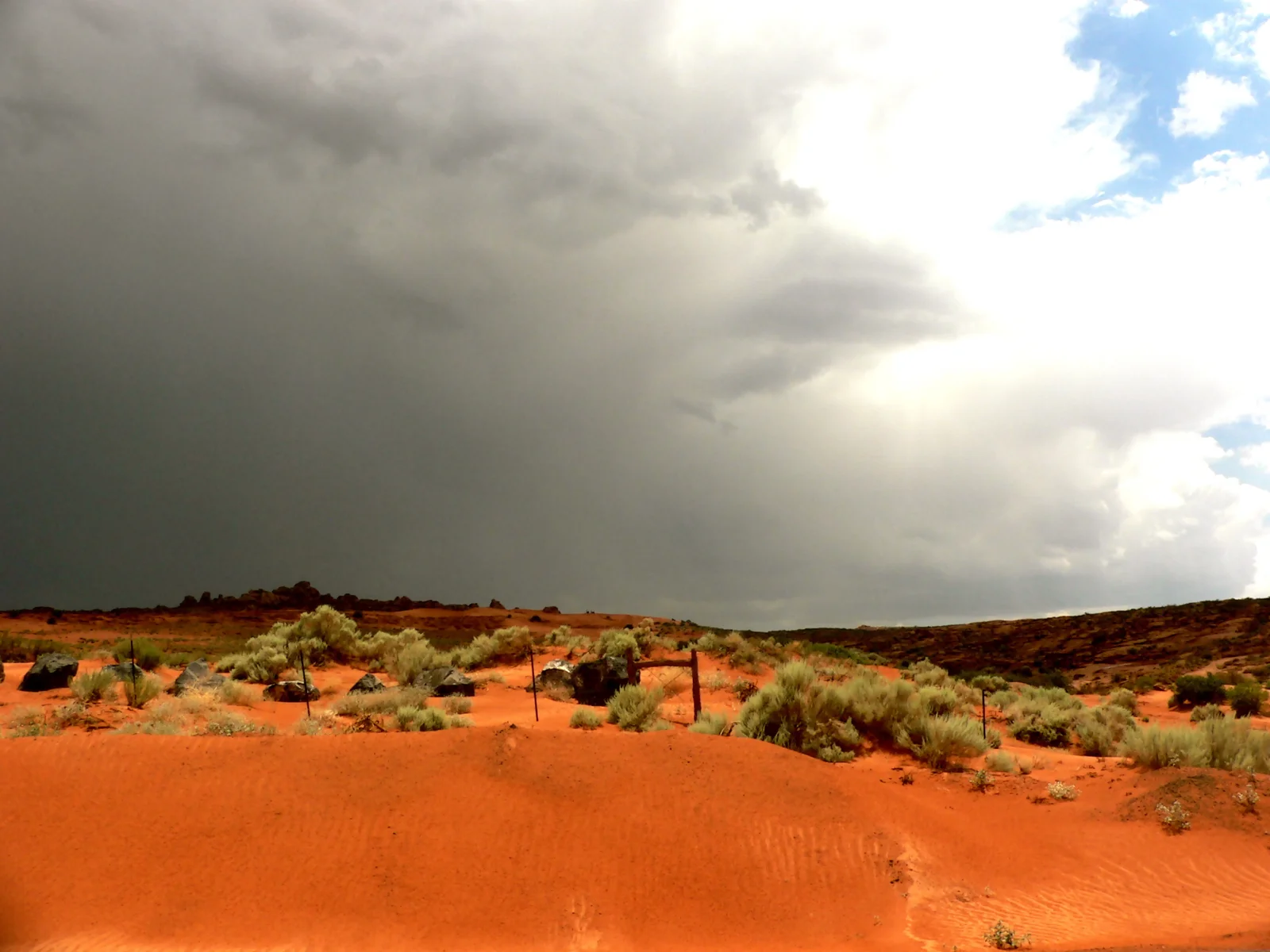 Sand Hollow Reservoir turquoise water and red dunes